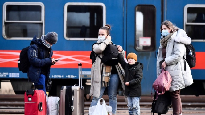 Bēgļi vilciena stacijā