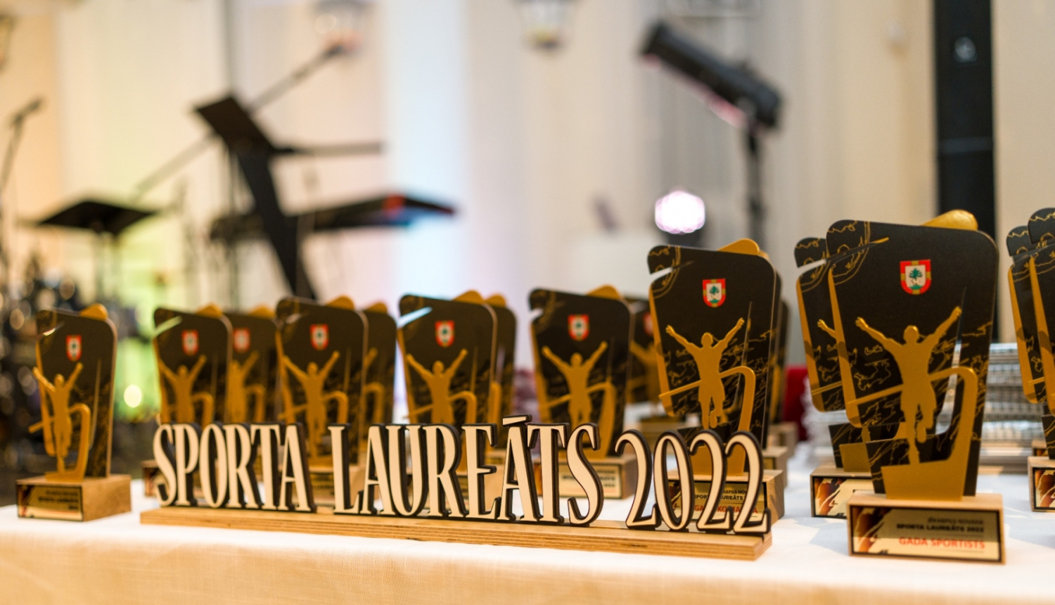 Ilustartivs attels ar sporta laureāts balvām