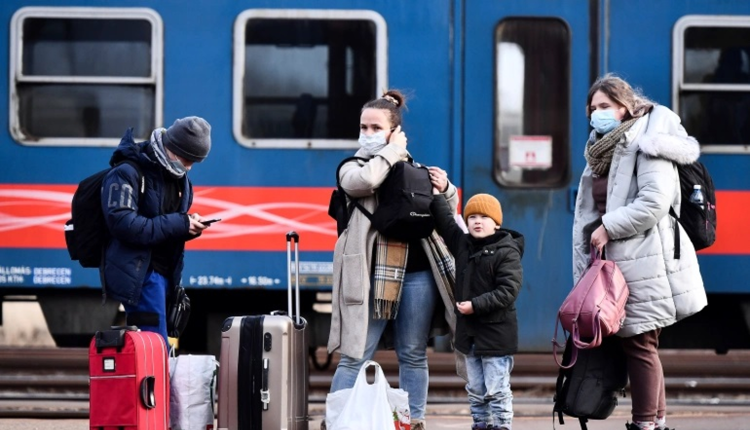 Bēgļi vilciena stacijā